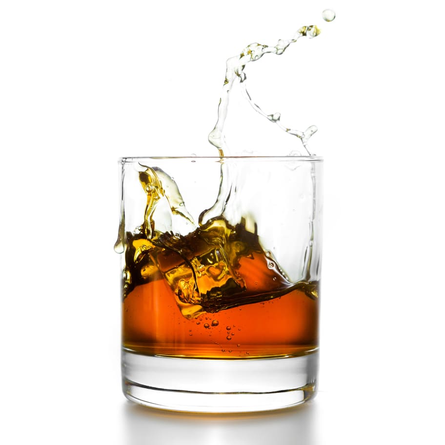 whisky-glass-with-splashes-isolated-on-white-2023-11-27-05-15-24-utc